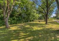 Spacious lot situated on almost an acre!