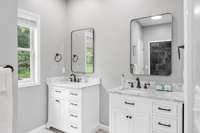 If you don't want to share a sink, you won't have to in this en-suite bathroom