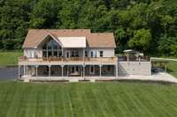 This double rear porch is the width of THREE 2 car garages, just to put the size in perspective.