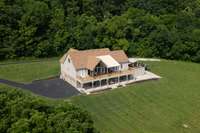 Following are a few aerial views of the exterior!  The inside of the home is beautiful as well, so be sure to keep swiping or clicking!
