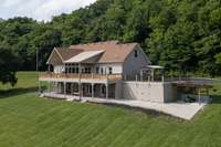 Additional covered storage.  This property also features an RV parking pad