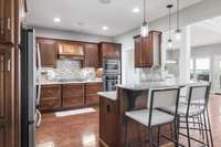 Hardwood floors and granite counter tops add just the right touch of natural warmth.