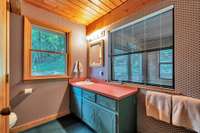 main level bath accessed from hall and bedroom