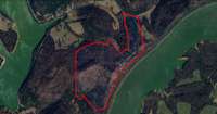 There is 563 ft of road frontage on Lakeside Drive, and 3580 ft of bluff frontage with several wonderful view points over the 117.75 acres.