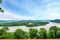 Wow, you can capture a full 150 degree world class view of  the bend of the lake and pastoral views across the lake