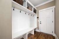 Drop zone just inside the main level garage and conveniently located directly across from the laundry room.