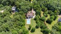 Double decker covered back porches with views for miles and both with wood burning fireplaces.