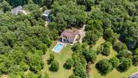 It's a stately property with a 42,000 gallon in-ground pool.