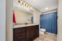 The ensuite bath to bedroom 3. This bath also connects through to the upstairs bonus room.