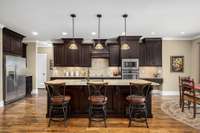 Stainless appliances, coffee nook, corner desk and sand & finish hardwood floors.