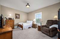 Bedroom 2 is located on the main floor and is a good size at 15x15. It has a window overlooking the backyard. This space could also easily be a main floor office, nursery, home gym... whatever your heart desires.