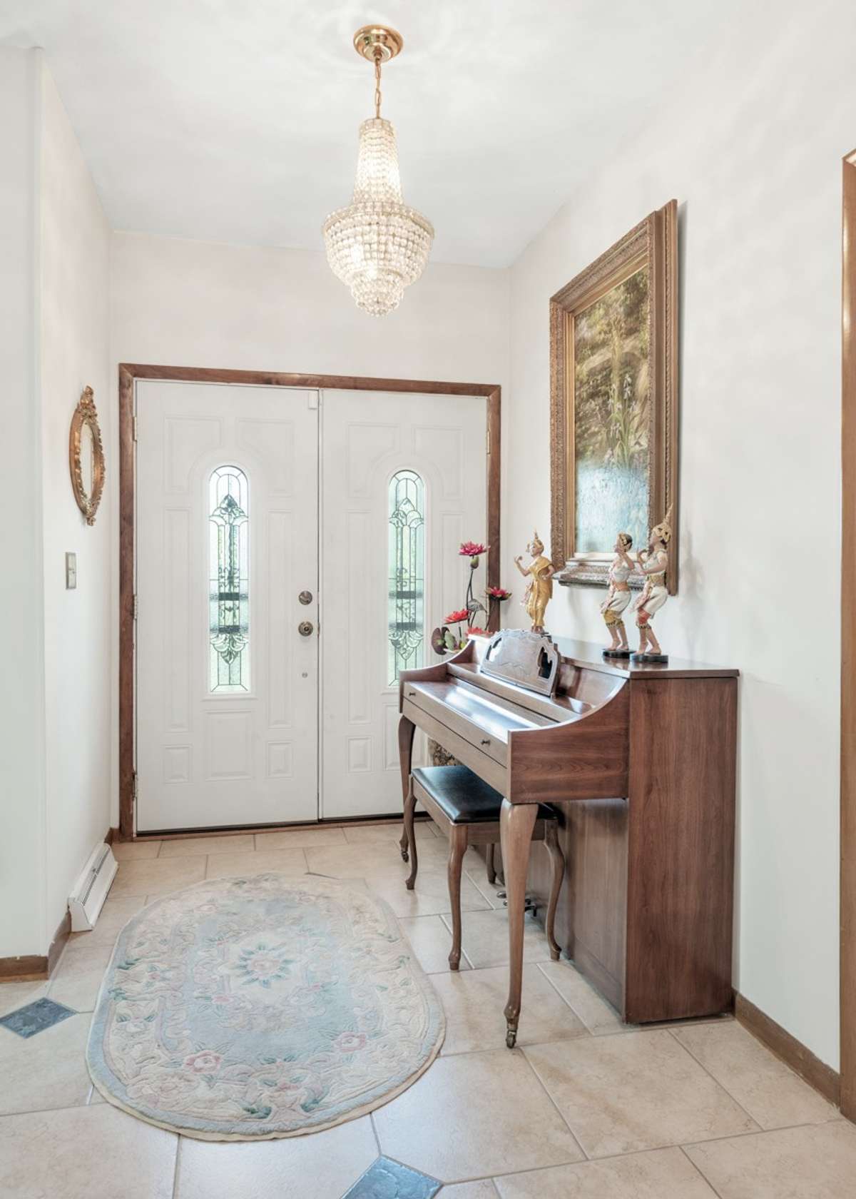 Welcoming entry with elegant double doors—open them to enjoy a stunning view of the Nashville skyline right from your foyer.