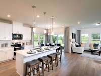 Photo is not of the actual home, but is an inspirational photo of builder’s model home and may depict options, furnishings, and/or decorator features that are not included