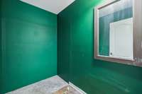 Unfinished bathroom space ready for your personal touch and customization.