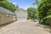 Side-entry 2-car garage with ample driveway space for guest parking.