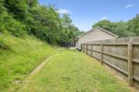 A backyard offering room for outdoor activities and relaxation.