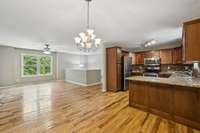 Spacious layout with connected dining, kitchen, and living areas.