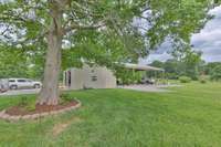 40x72 building with 40x24 covered workshop.  Has electric and water and rv hookups.