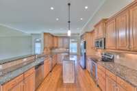 Granite counters and tile backsplash