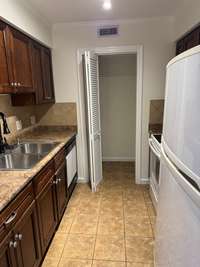 The refrigerator is almost new too, and remains!