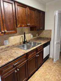 Updated kitchen with new microwave, newer fridge. Stackable washer and dryer included in the sale.
