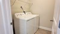 Laundry room is convenient to bedrooms.  Washer and Dryer can stay!