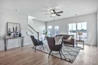 Living room will have doors leading out to your large covered balcony. Photos from previously built home for example.