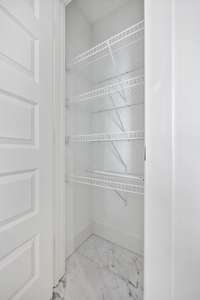 Linen closet tucked away in the owners bath. Photos from previously built home for example.