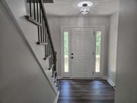 Beautiful Staircase with 
Wood and Black Iron