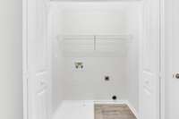 Laundry closet in upstairs hallway