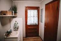 Door off of Laundry room leads to the outside.