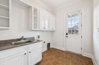 Side entry and laundry room
