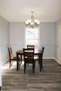 Formal dining room or office/study. Doors that close off area from kitchen and Great Room.