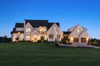 The exterior lights make a warm, inviting welcome home in the evening