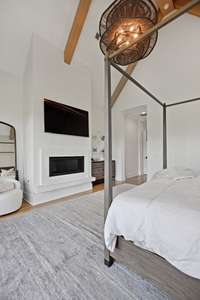 Enjoy a cozy fire with the gas log fireplace in the primary suite