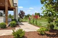 Exterior walkway along back of house between main residence and guest house/additional garages