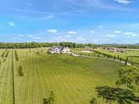 Enjoy living in the country, but minutes from shopping, dining and restaurants