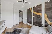 The office is located on the hallway to the Primary suite