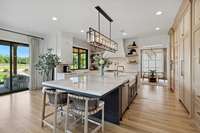 Island seating and floor to ceiling storage