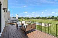 Enjoy a lovely view of the property from the guest house balcony
