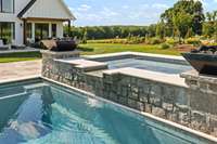 Spa with waterfall spillover..