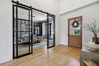 The iron and glass doors were locally handcrafter