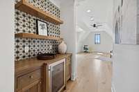 Coffee/wine bar on 2nd floor leading into bonus room