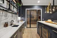 Marble counter, backsplash and mini fridge