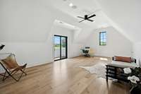 Bonus room with sliding doors to large balcony that overlooks the property