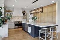 A large sapienstone island is the focal point of this lovely space