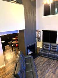 Living room with hardwood floor coverings; 2 Bedrooms upstairs and 2 full baths; 1/2 bath downstairs