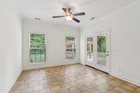 Cozy smaller family room or eat-in dining area, opens onto the back covered patio.