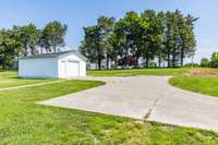 Oversized one car garage-paved driveway and paved walks.