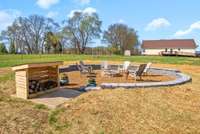 Large firepit and outdoor entertainment area, also water and electric access in this area.